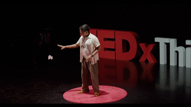 Sanjay on stage at TEDxThirdWard